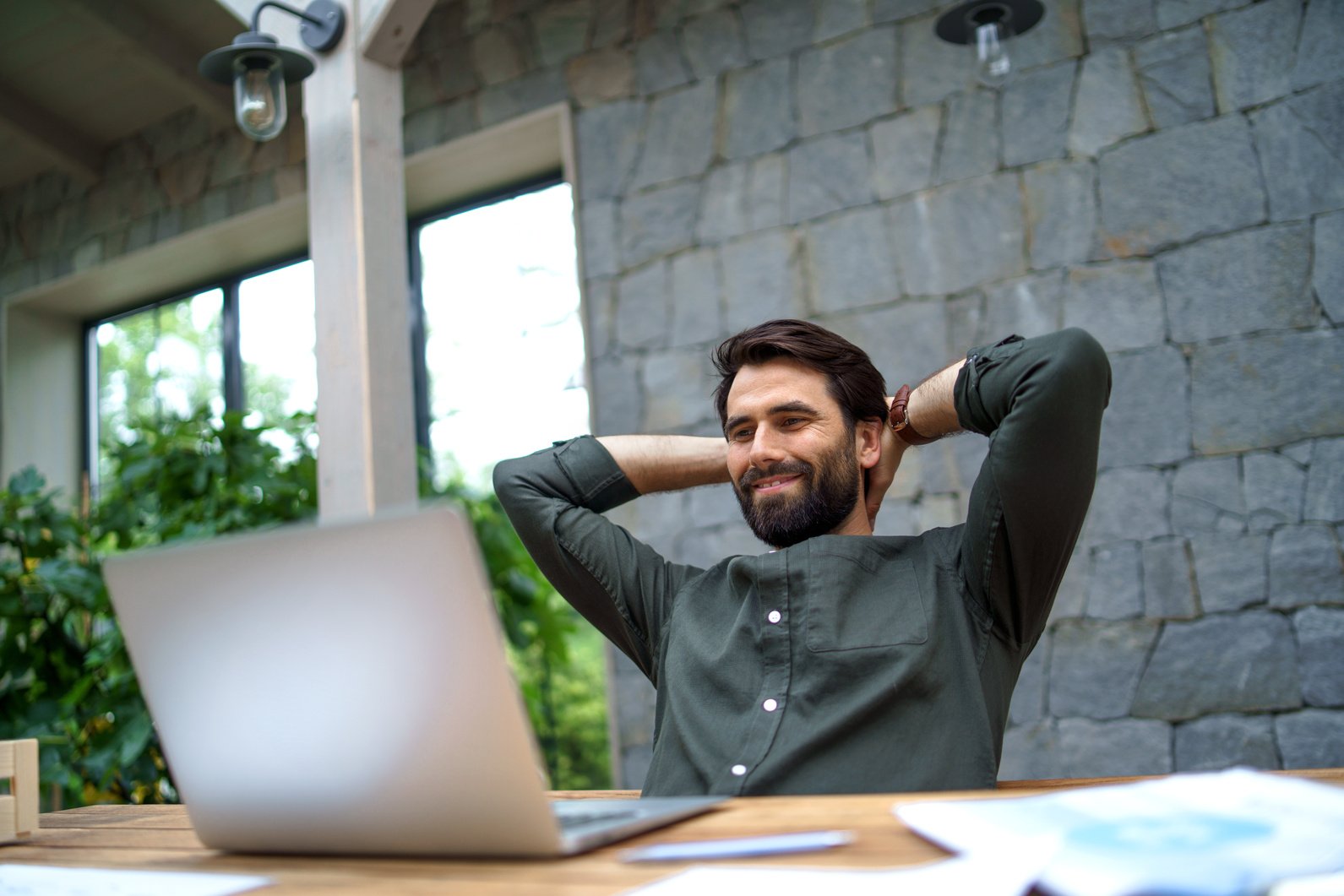 Happy Man Working on Laptop